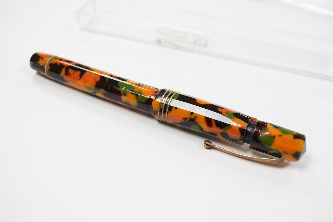 An Omas orange, green and black marble Paragon fountain pen (shrinkage to cap)